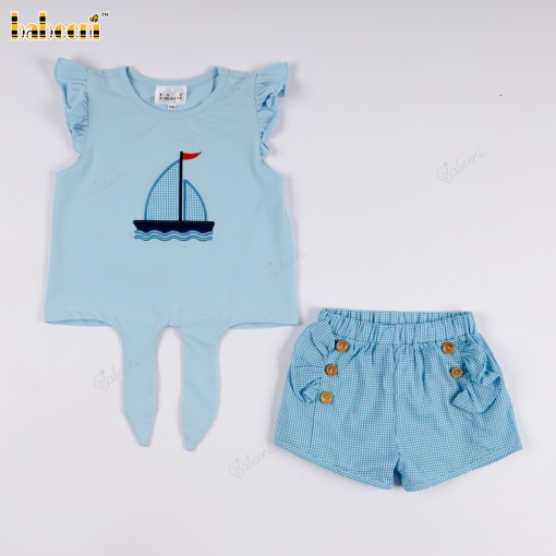 Set includes a T-shirt with embroidered sailboat and checkered shorts.- BB3563